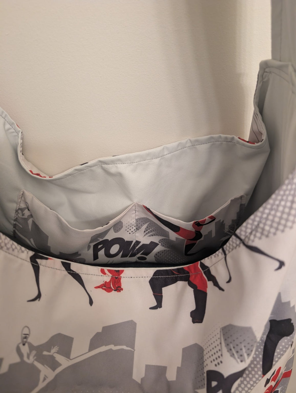 Close-up showing the roomy divided pocket configuration